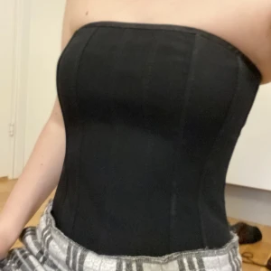 Korsett!  - Ett svart korsett köpt av min mamma i London på 90-talet! 