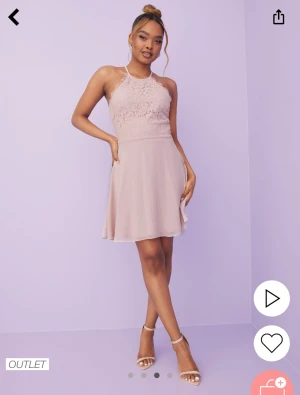 Klänning  - Klänning från Nelly i storlek 34. Aldrig använd med lappen kvar.