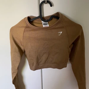Oanvänd gymshark tröja - Säljer pga dom skickade fel produkt! Aldrig använd💘 Storlek S