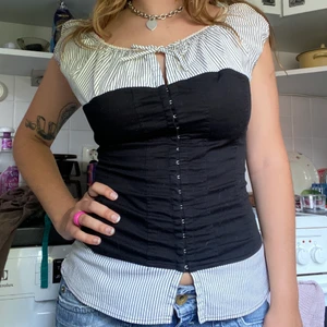 corset shirt  - great condition. i sewed it in a little on the sides but it not so noticeable. 