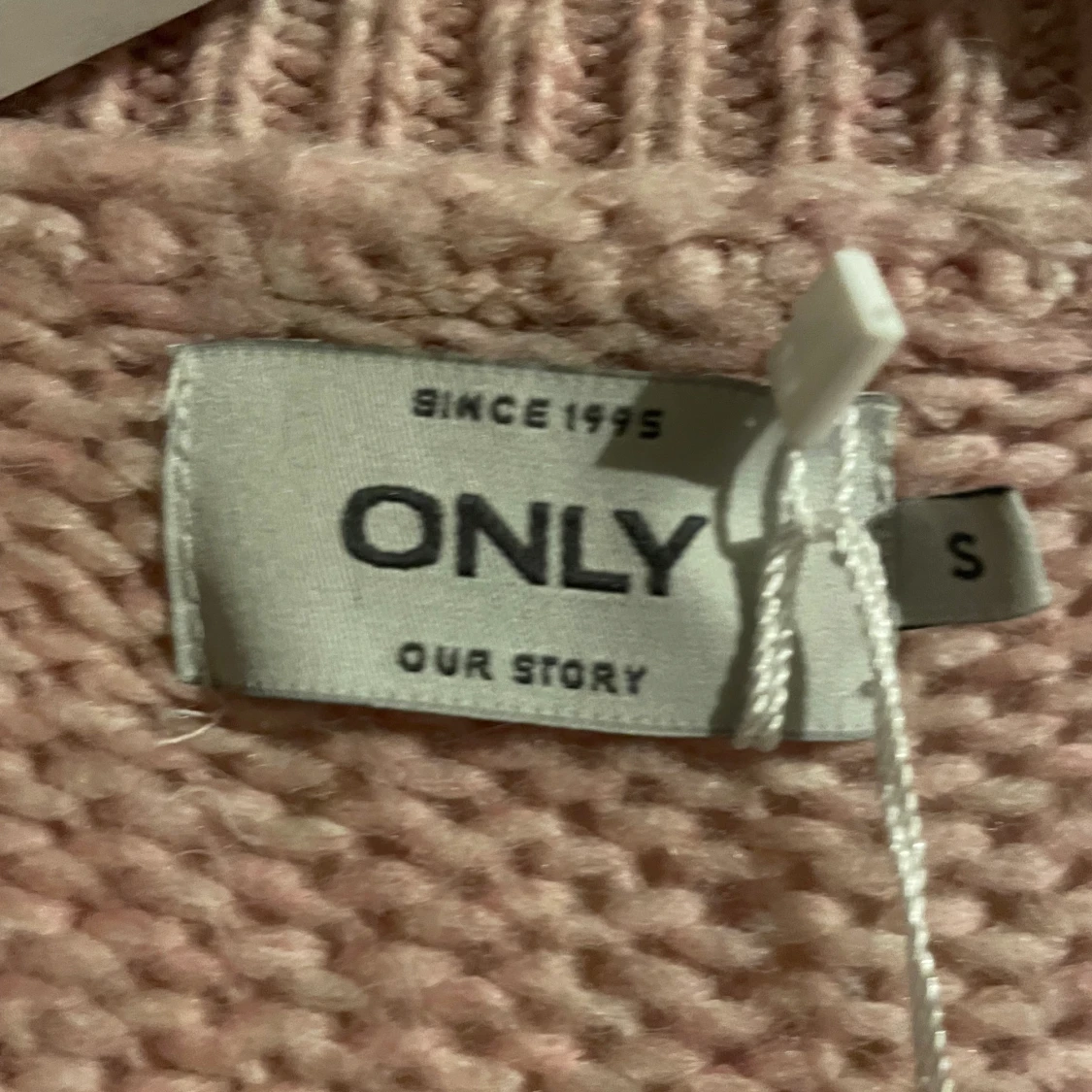 Stickad rosa tröja - 90