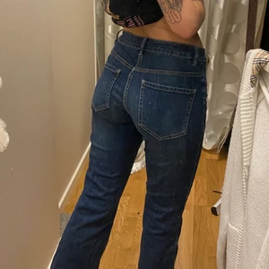 Bootcut jeans - Blåa bootcut jeans från Lindex i storlek S.