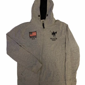 Polo Zip up - .