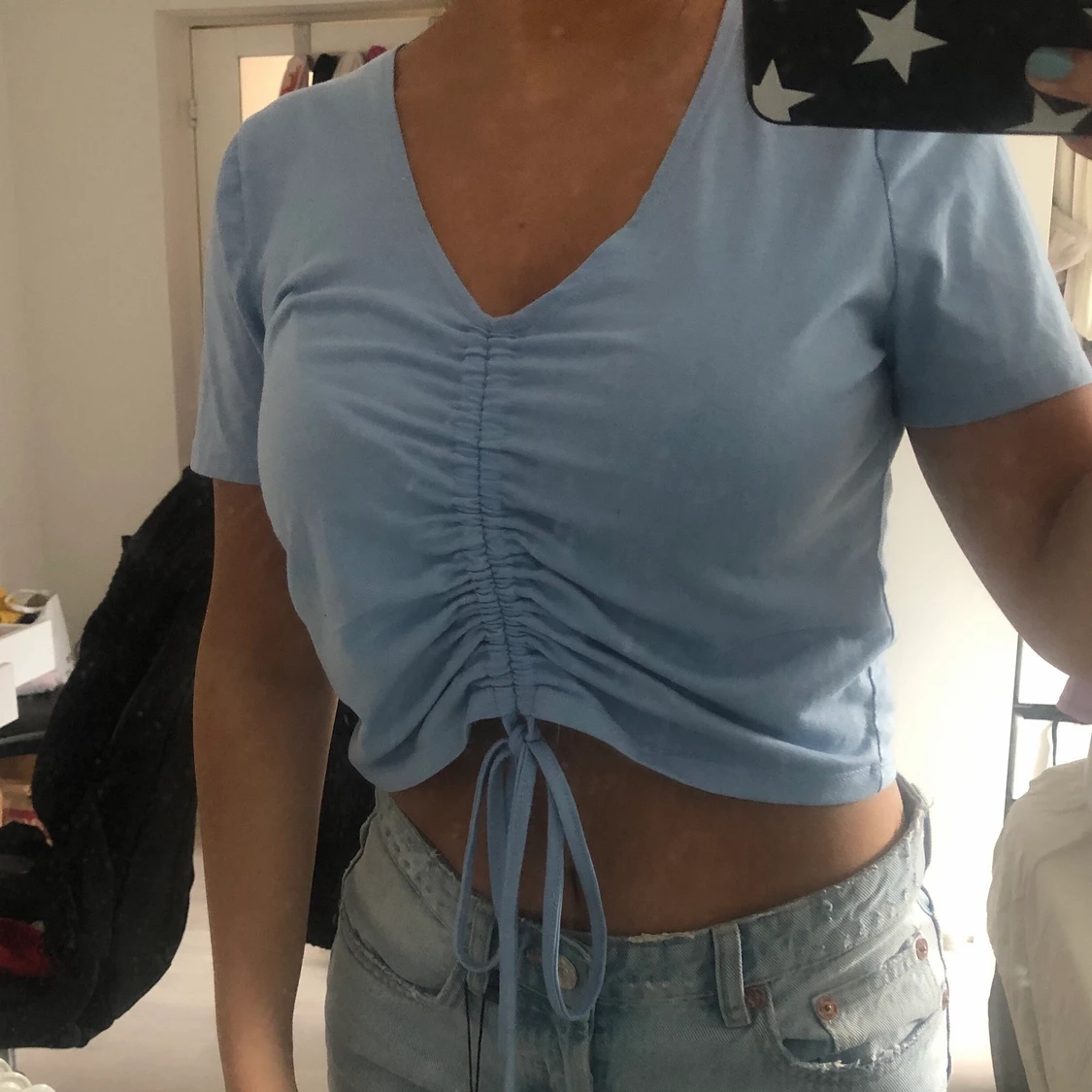 Blå t shirt med dragsko  - 90