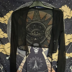 Mesh Wrap Top - En galet snygg topp i mesh som du snörar runt midjan. 