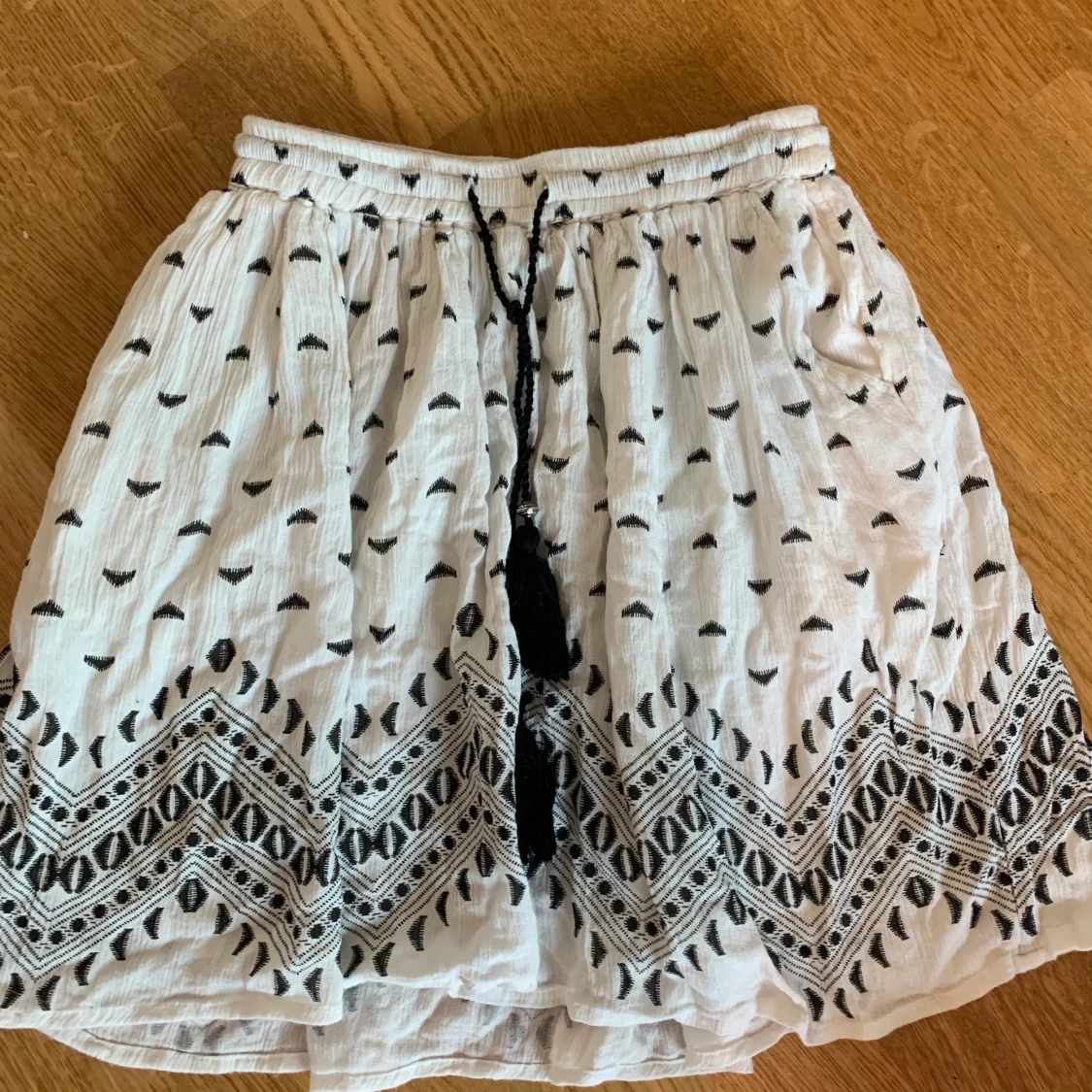 Ljus sommar tjol, med fickor.