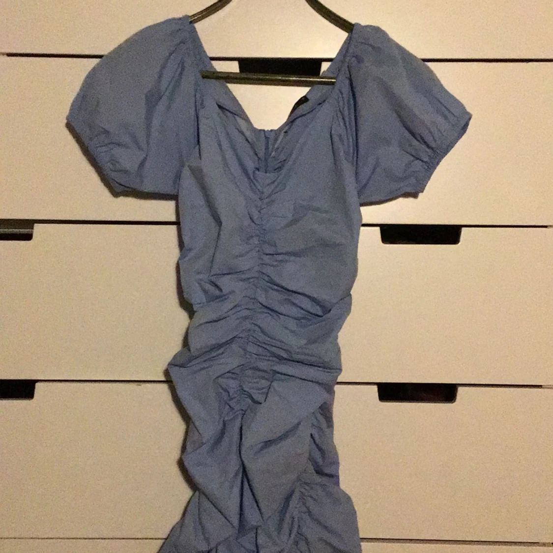 Figurfotmaf klänning