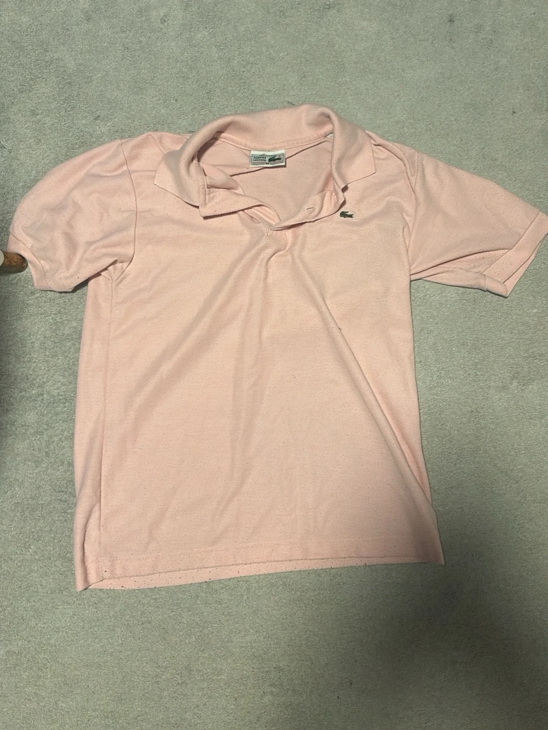 Ljusrosa pikétröja från Lacoste