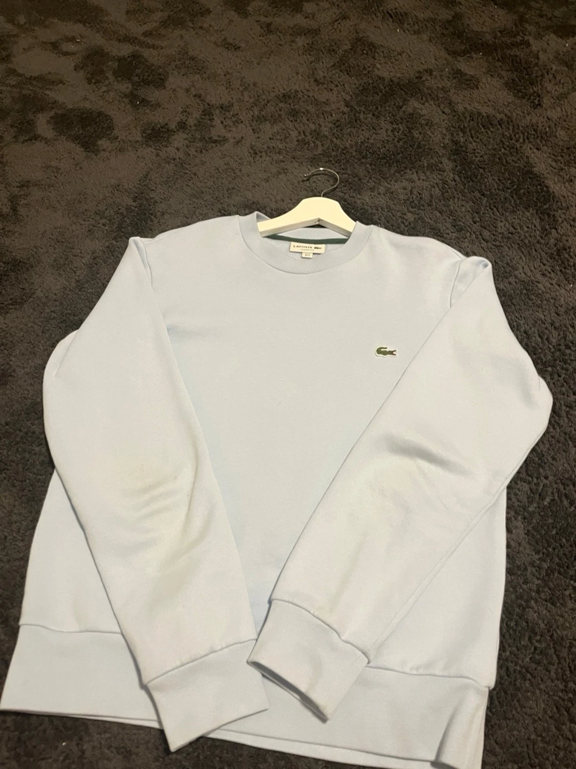 Ljusblå sweatshirt från Lacoste