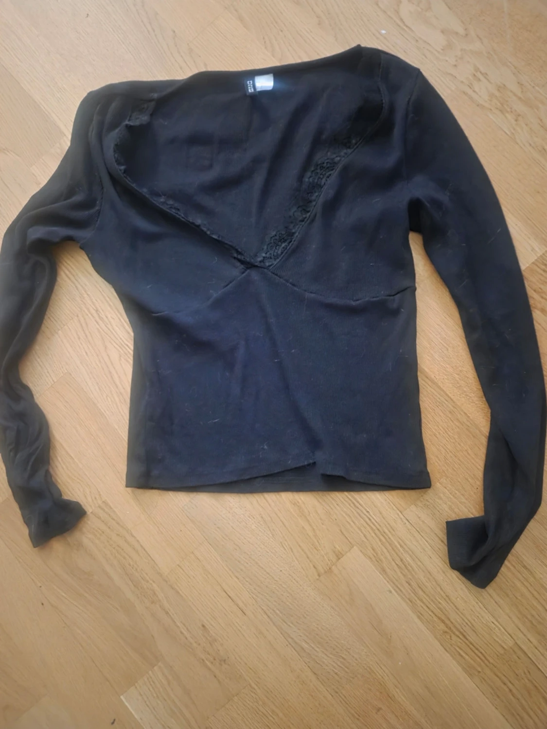 Svart långärmad topp med spets