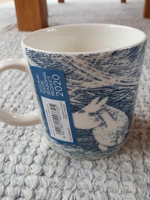 Muminmugg Snöyra Mumin  - Utgången felfri mugg med etikett kvar. Packar mycket bra. 