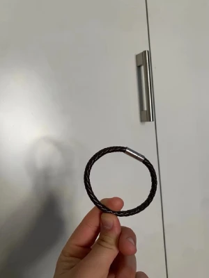 2 armband  ett stål ett brunt flätat bundle - Till för ludde