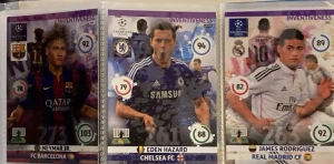 FIFA Champions League samlarkort 2014/2015 inventivies  - Tre samlarkort från FIFA Champions League med Neymar Jr. (FC Barcelona), Eden Hazard (Chelsea FC) och James Rodriguez (Real Madrid CF). Kort i färgstark design med klubbmärken och spelarnas stats. Perfekt för dig som gillar fotboll och samlar på spelkort.