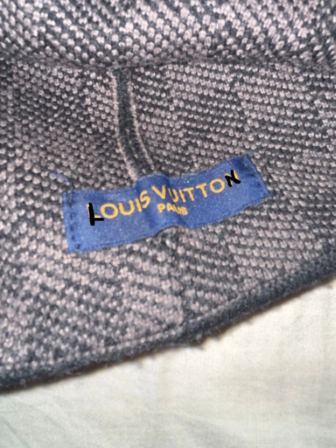 Gråmelerad mössa med rutmönster - 2