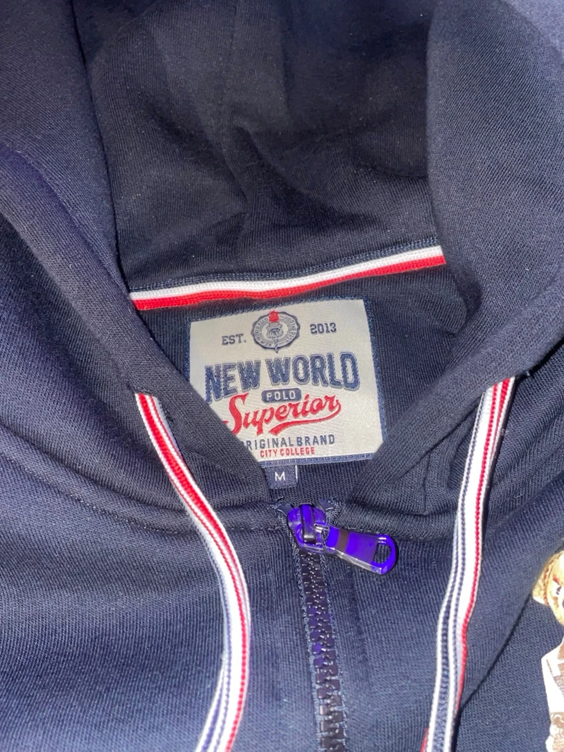 Mörkblå hoodie från New World Polo - 1