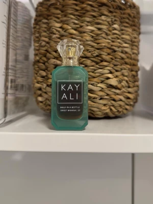 Kayali Maui in a bottle 10ml - Kayali Maui in a bottle 10ml, se mängd kvar enligt bild. 🍌💗