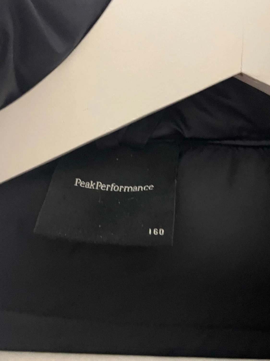 Svart dunjacka Peak Performance - 1
