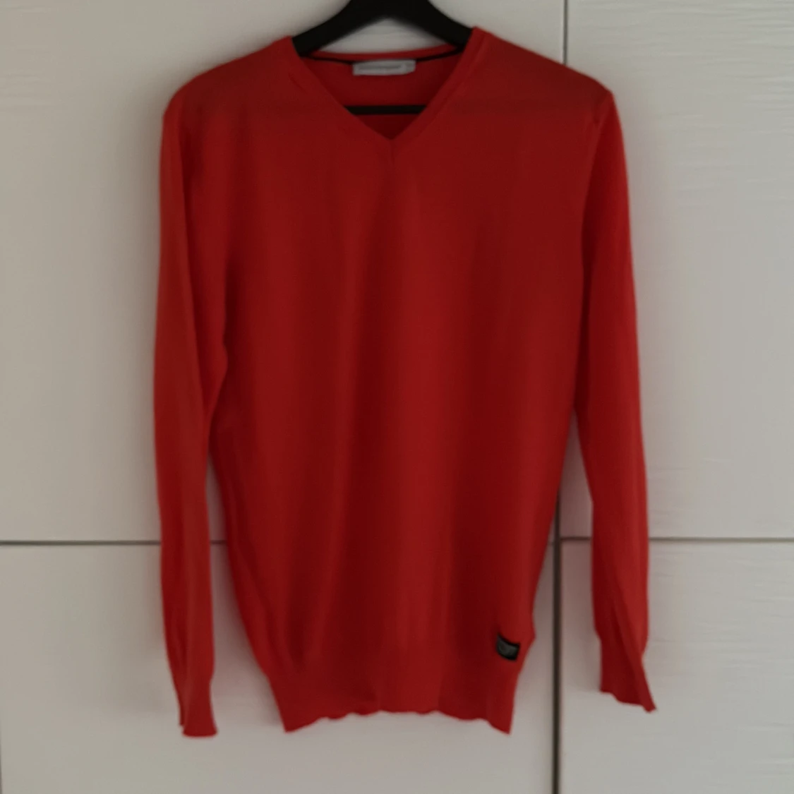 Orange Peak Performance V-ringad tröja