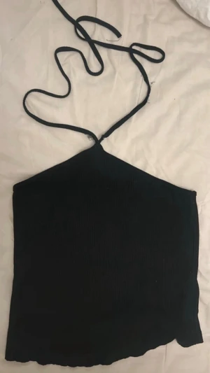 Halterneck topp - Svart halterneck topp från NA-KD i storlek M