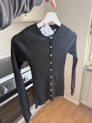 Långärmad topp - Ny med lappar