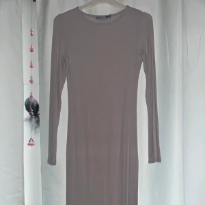 Långklänning  - En långklänning från lager 157 storlek XS passar S också. Aldrig använd.