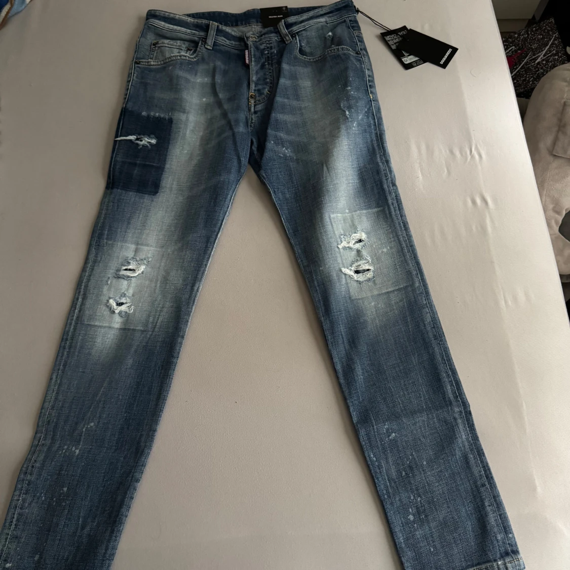 Dsquared2 blå patchade jeans