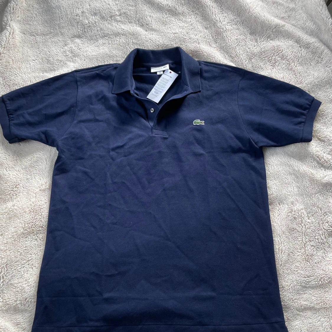 Mörkblå pikétröja från Lacoste - 2