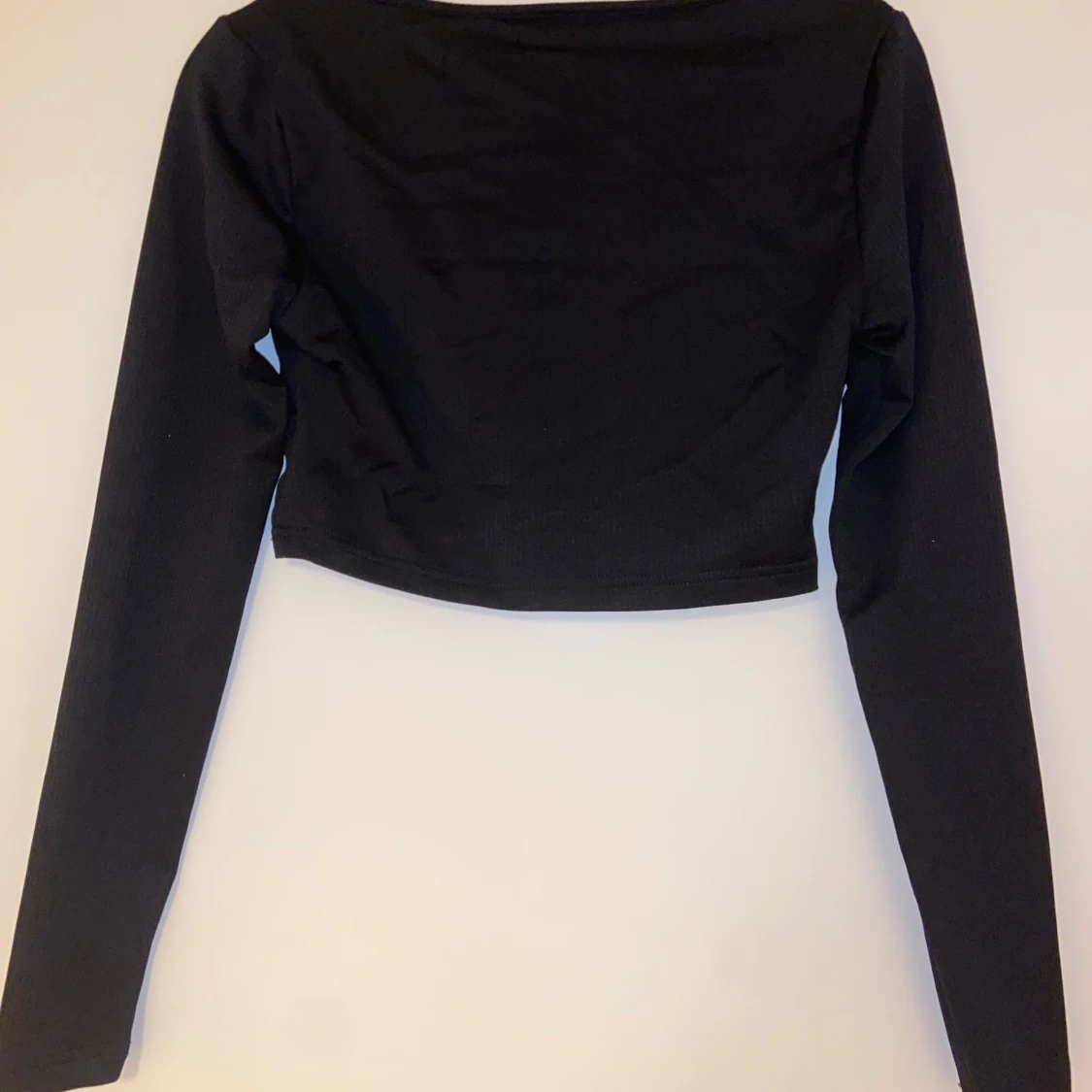 Svart långärmad topp med matchande kjol - 1