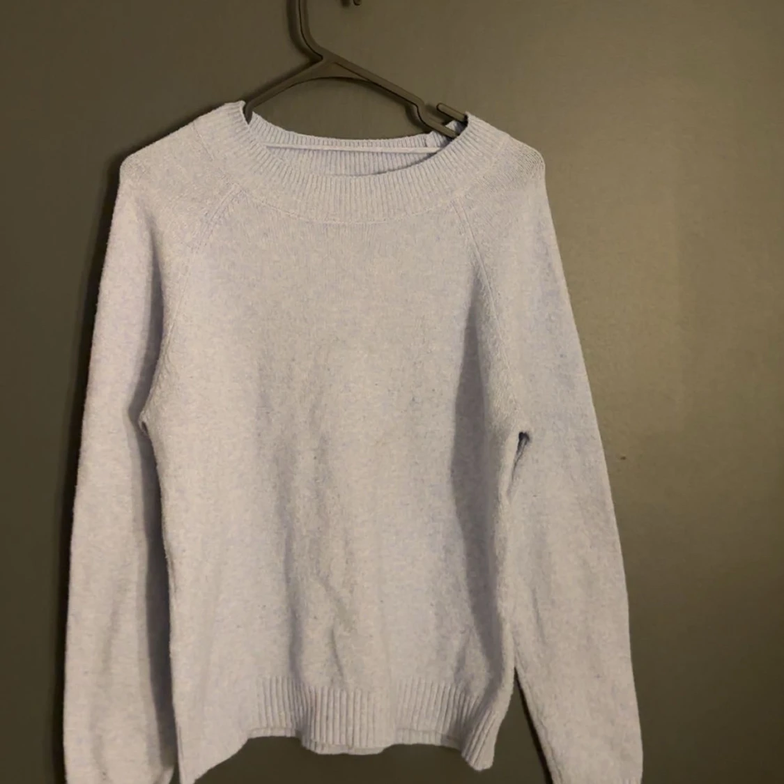 Ljusblå stickad tröja