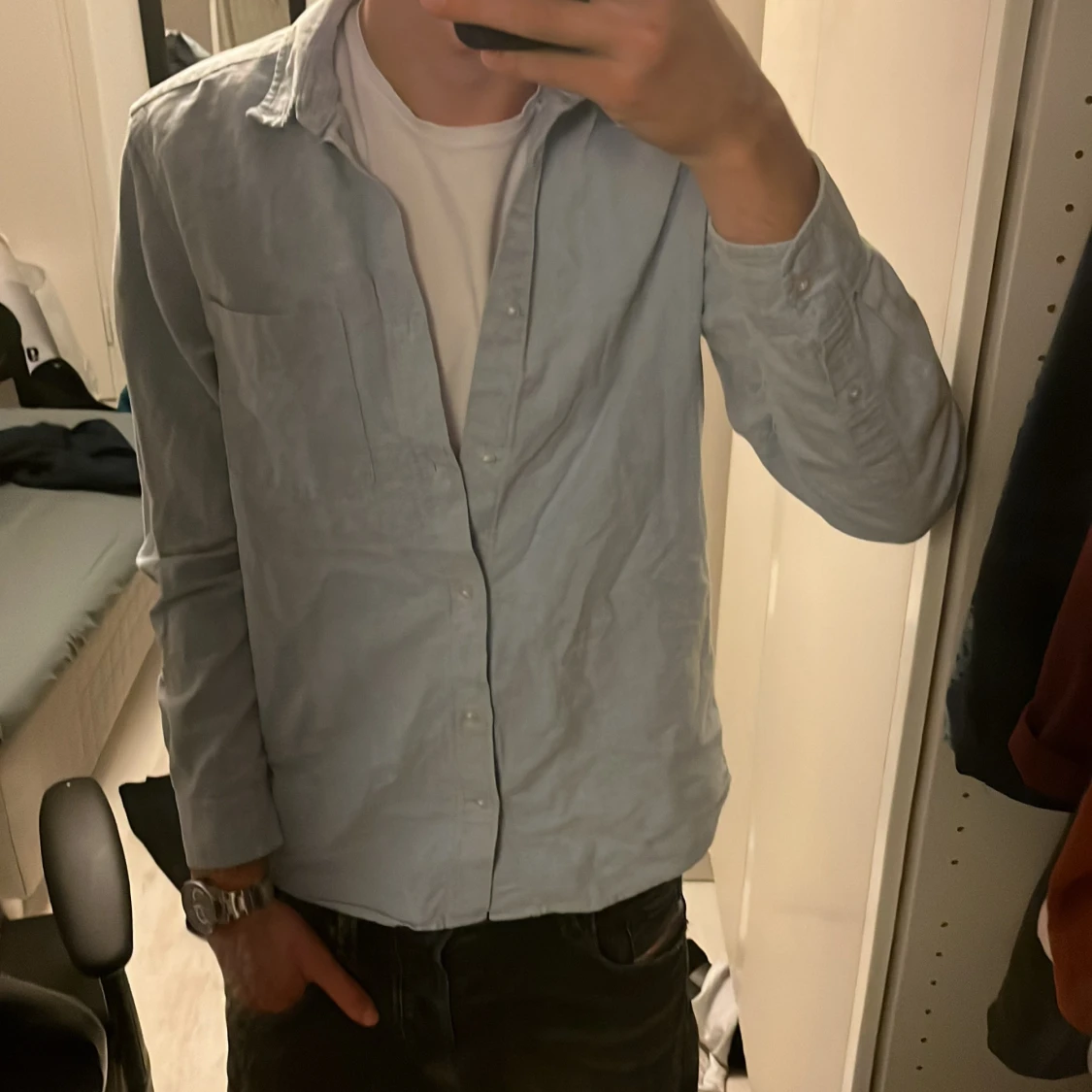 Ljusblå bomullsskjorta med knappar - 1