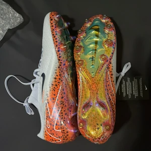 Nike fotbollsskor med orange och svart mönster - Nike mercurial 16 Ag A-copia 