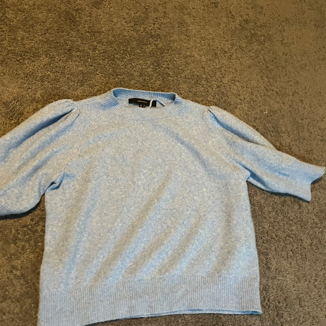 Ljusblå stickad tröja