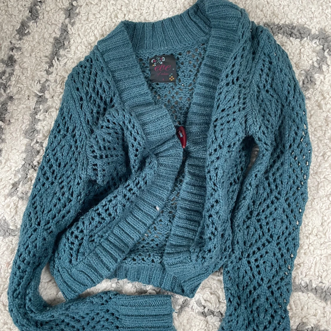 Blå stickad kofta från Eve of Eden