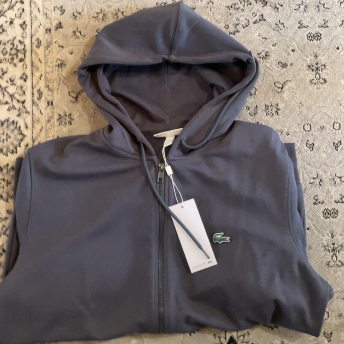 Mörkgrå hoodie från Lacoste - 1