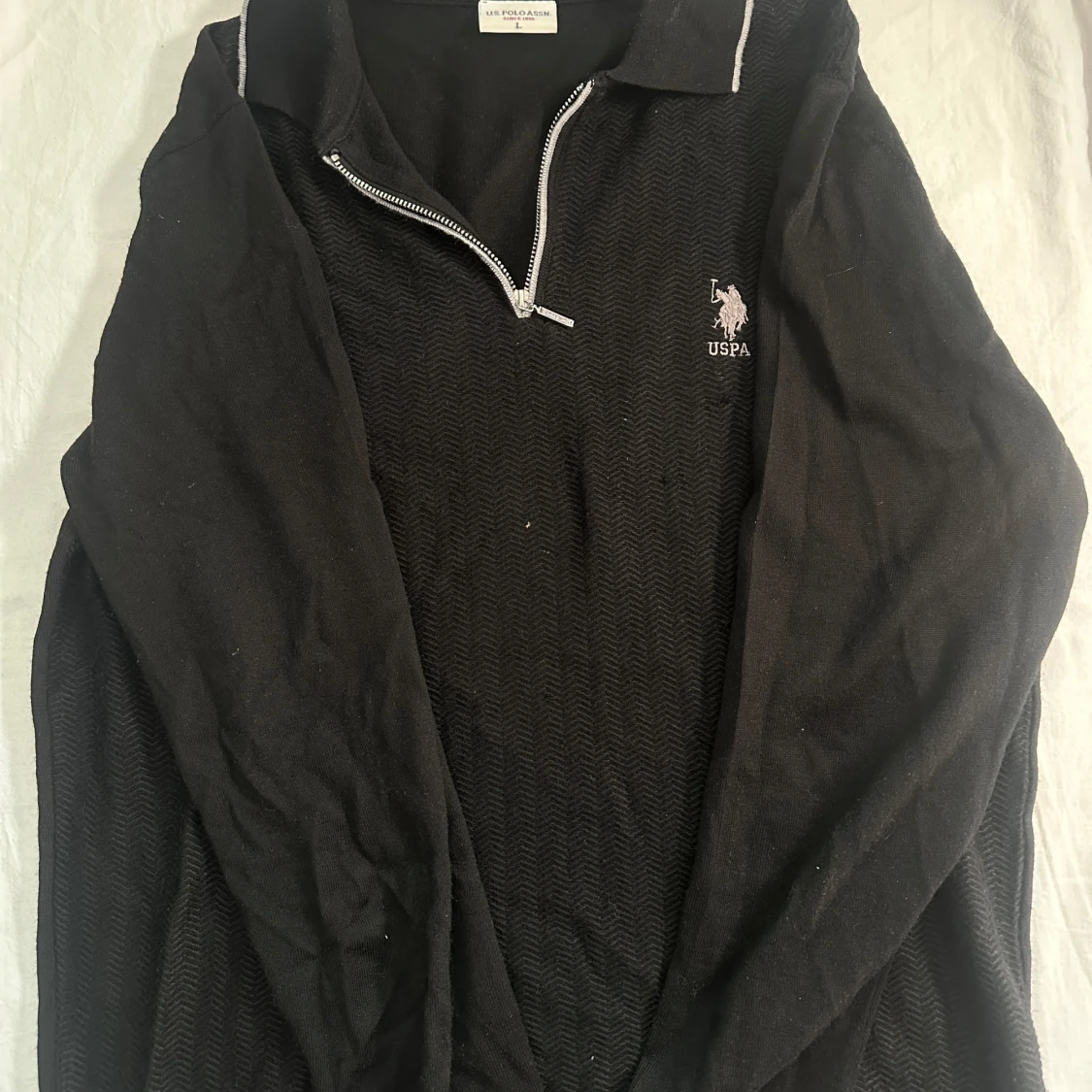 Svart half zip tröja från US Polo Assn