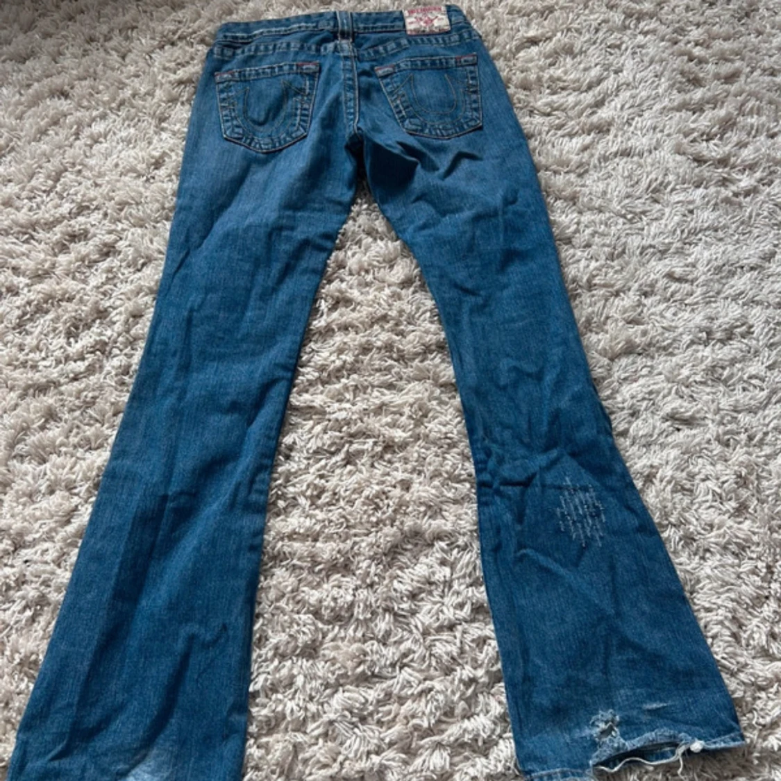 Blå bootcut jeans från True Religion - 2
