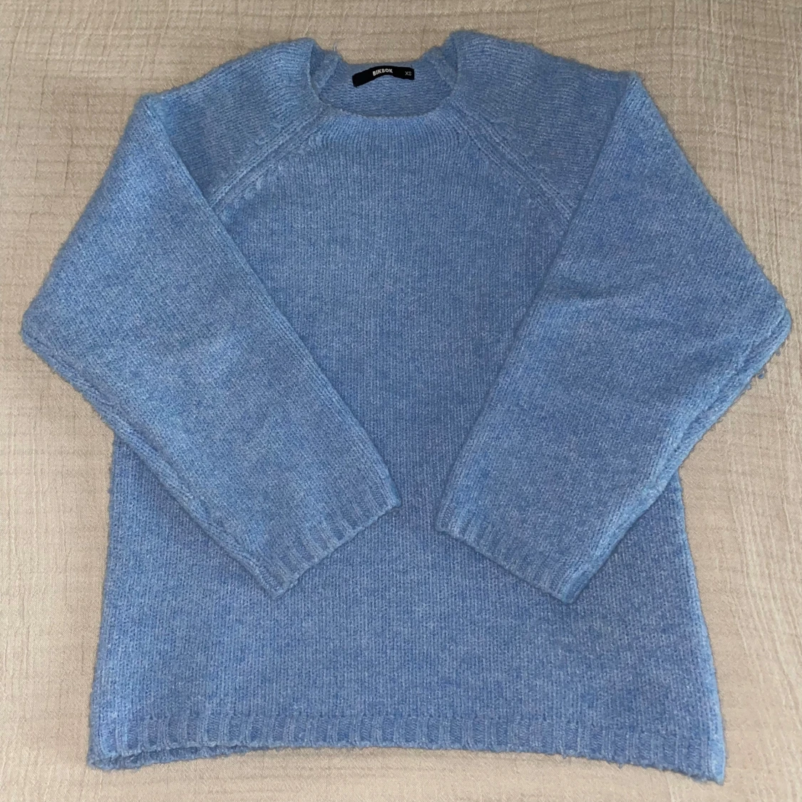 Ljusblå stickad tröja från Bikbok