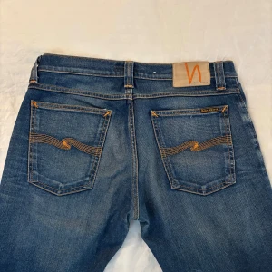 Nudie Jeans - Snygga Nudie jeans med nice wash. Storlek 30/32. Modell Tube kelly. Skick 10/10 Nypris 1600kr. endast använda 1-2 gånger.
