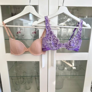 2st Lounge Underwear bhar - 2st nya och oanvända Lounge Underwear bhar i beige ribbat och lila spets, båda är i storlek 70C. Köptes för nypris 975kr! FÖRST TILL KVARN!
