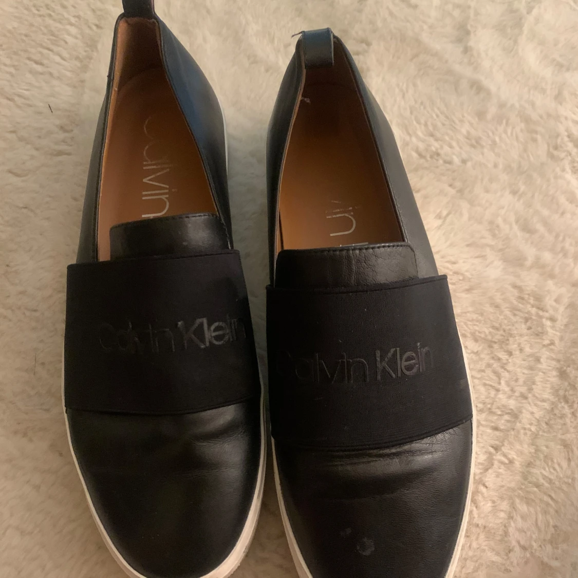 Svarta slip-on skor från Calvin Klein