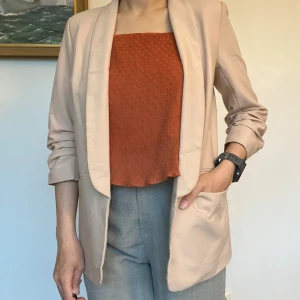 Blush pink blazer - Chic and versatile blush pink blazer with a relaxed open-front design, subtle tailoring, and ruched sleeves for an effortlessly polished look. Pairs beautifully with both workwear and casual outfits.  🌟 Check out my other listings for bundle deals!
