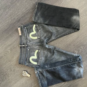 Evisu x Puma Women’s Jeans - 🏷️ Brand: Evisu 📐 Size: S 🎨 Color: Navy Blue 🧵 Material: 100% 👕 Fit: Bootcut 📏 Length: Regular ⭐ Condition: Worn a few times ⚠️ Defects: None