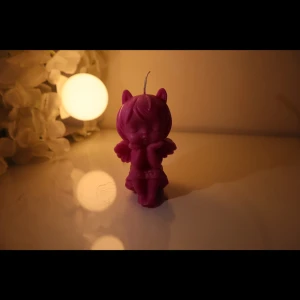 Shy Girl Candle - A charming purple bunny-shaped candle, lovingly hugging a smaller bunny. Perfect for gifting or as a cozy decor piece for Easter setups, or whimsical home aesthetics. Hand-poured with attention to detail. H: 8.8cm B:7.7cm