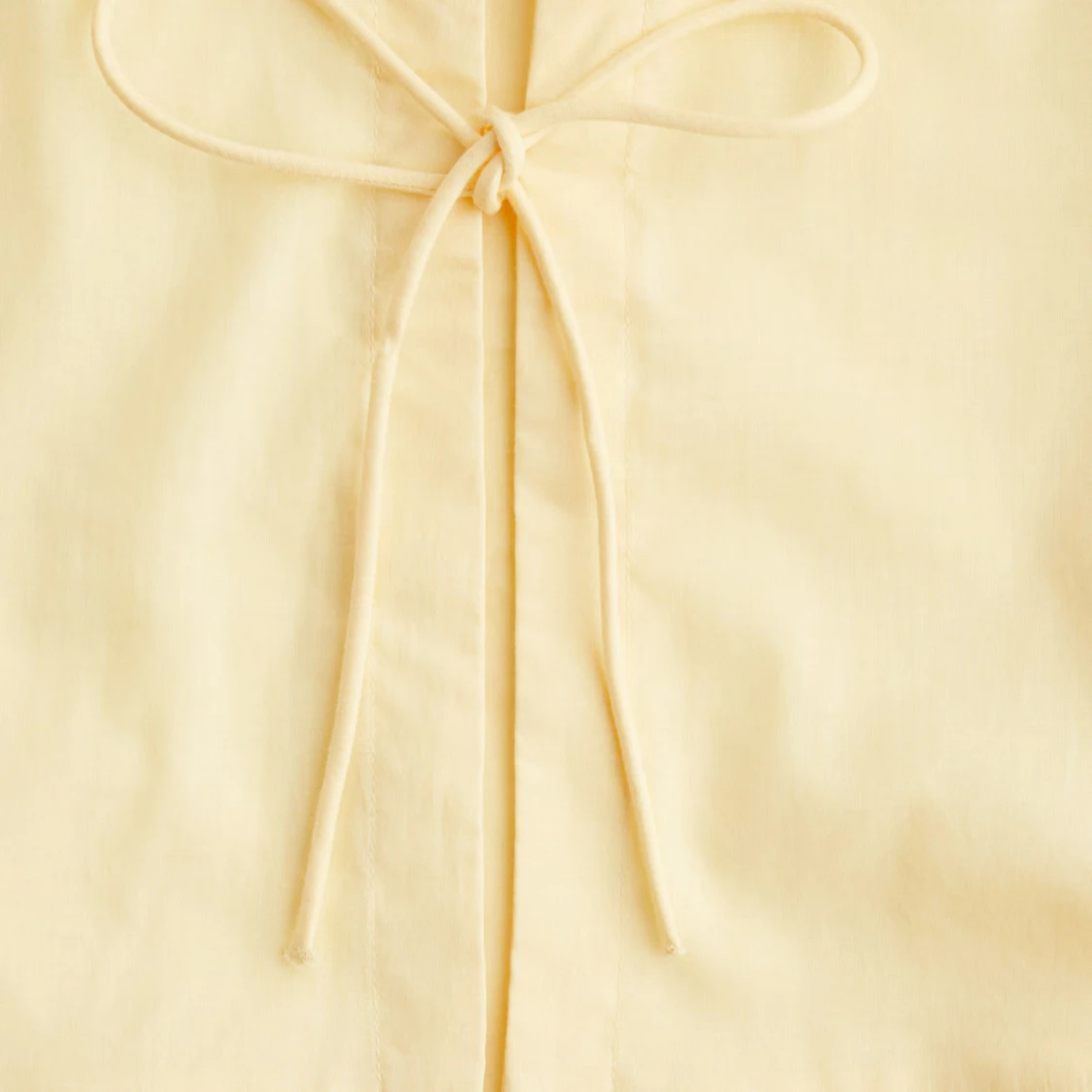 Gul blus med volang och knyt från Divided - 2