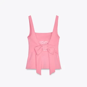 Rosa topp med rosett  - Rosa topp från zara, använd 1 gång 