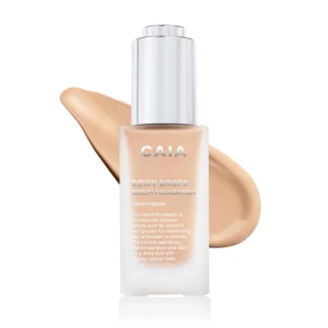 CAIA Dewy Drops 20W  - Foundation från CAIA i nyansen 20W. Kommer i en frostad glasflaska med silvrig överdel. Ger en naturlig, återfuktande finish och innehåller vitamin E och glycerin för extra vård. Perfekt för dig som vill ha en fräsch och glowig bas! Använd cirka 4 gånger 