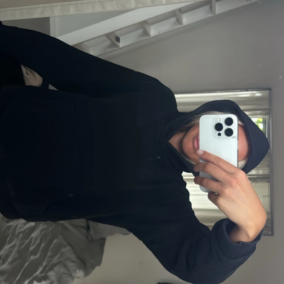 Svart hoodie från Peak Performance 