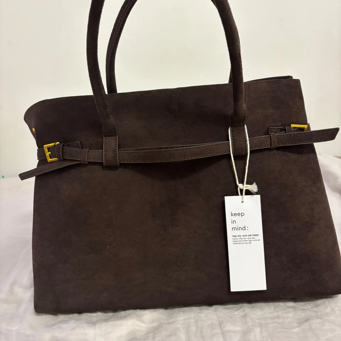 Mörkbrun mocka handväska med bälte