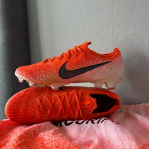 NIKE MERCURIAL VAPOR ELITE 12 FG EUPHORIA - NIKE MERCURIAL VAPOR ELITE 12 FG EUPHORIA | Storlek 41 | De är i ett mycket gott skick då de använts sparsamt | Skriv vid fler frågor eller bilder 