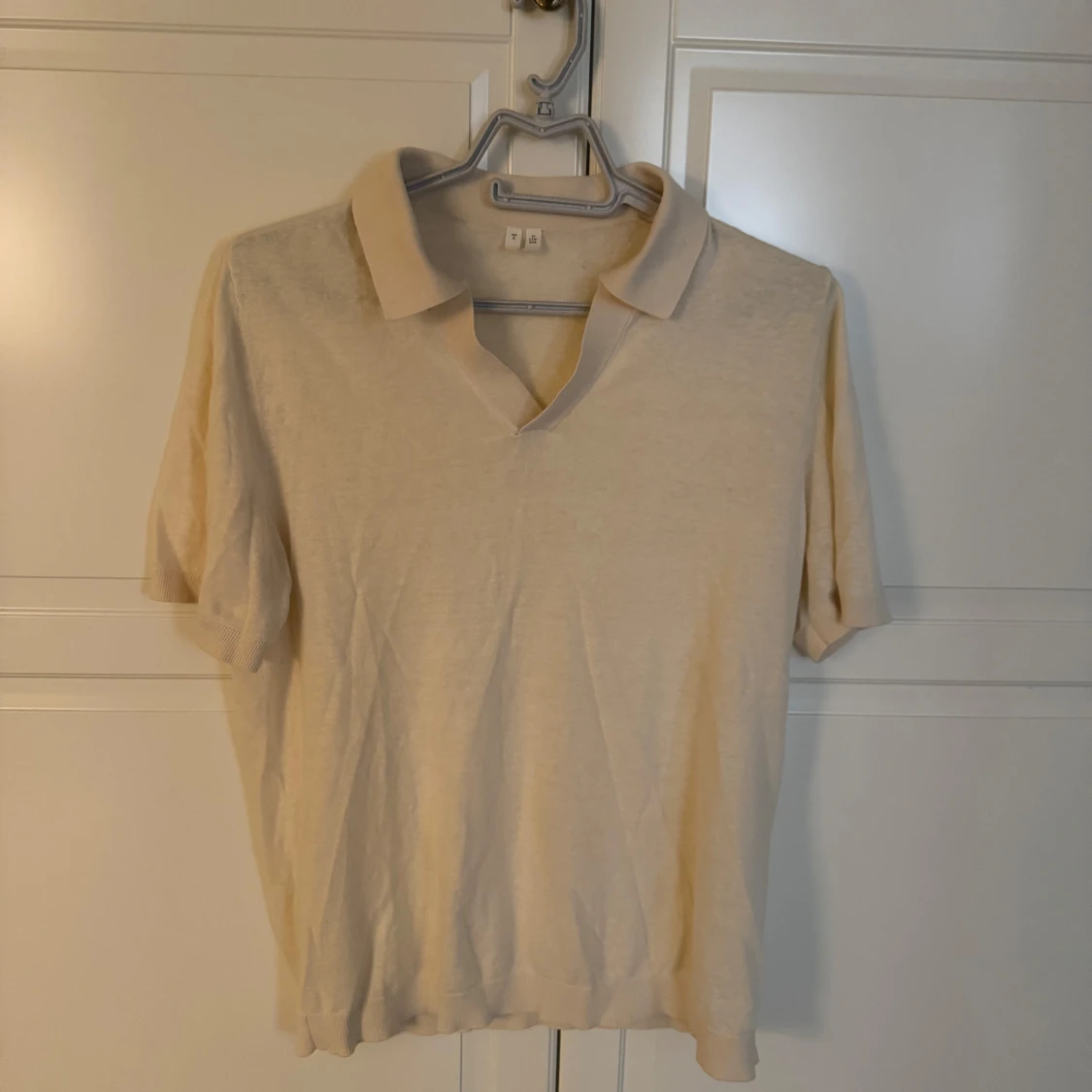 Beige pikétröja Arket 